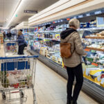 PHOTO: After three years of wild price gallop, good news is returning. Shoppers at the discount supermarket LIDL, Hamburg, Germany