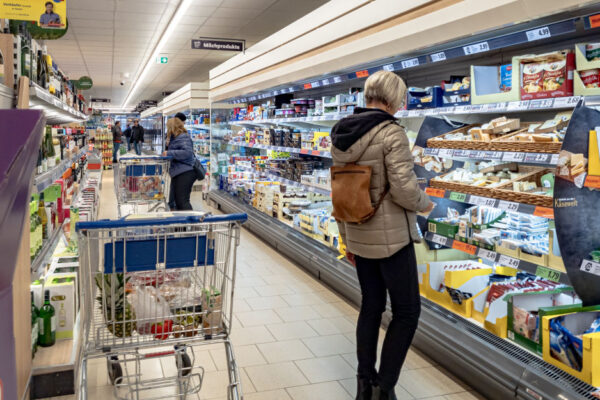 PHOTO: After three years of wild price gallop, good news is returning. Shoppers at the discount supermarket LIDL, Hamburg, Germany