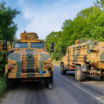 Ukrainian armoured vehicles on a road